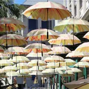 A street lined with colourful umbrellas