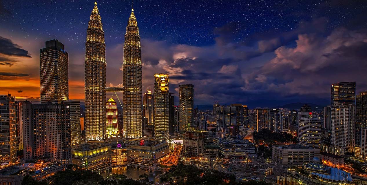 Night-time view of the Petronas Twin Towers in Kuala Lumpur, Malaysia