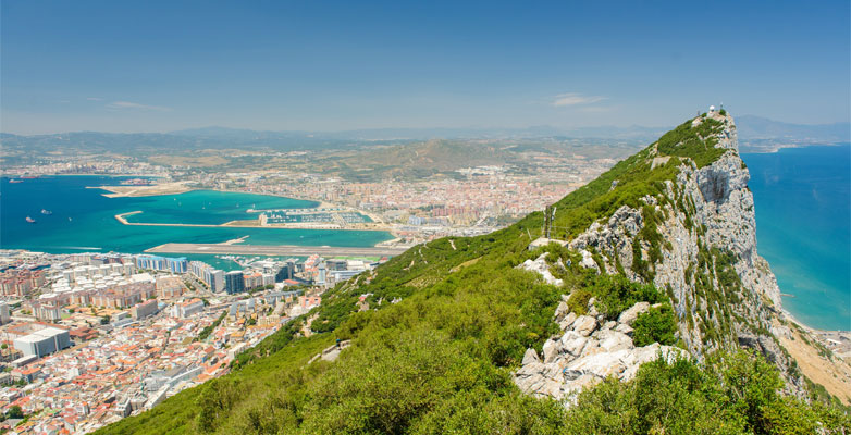 The Rock of Gibraltar is a large rock formation that towers above the town area