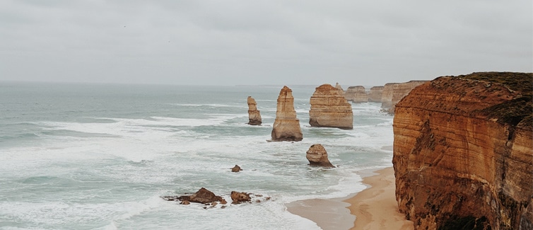 A group of rocks on a coastline in Australia