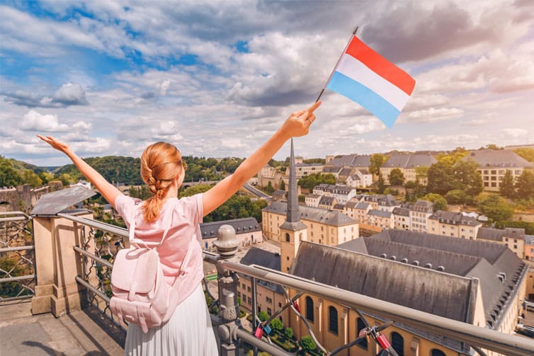 Lady holding Netherlands flag