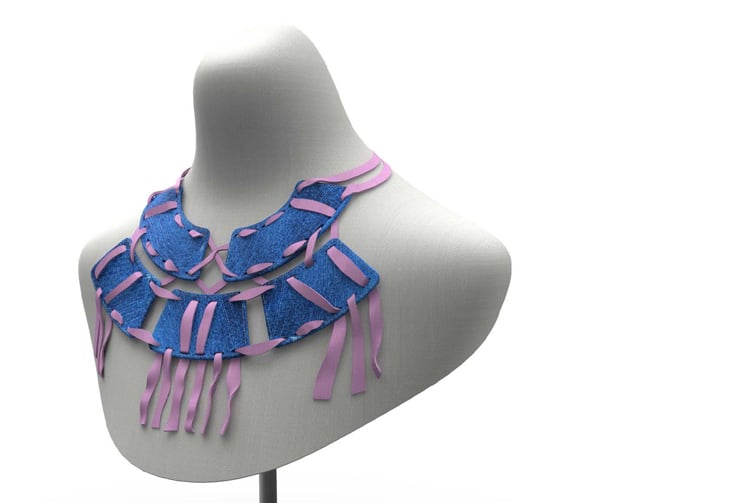 Image of a mannequin wearing a blue and pink necklace.